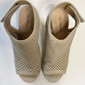 Peep Toe Booties with Block Heel 
New-only tried on and never worn out.